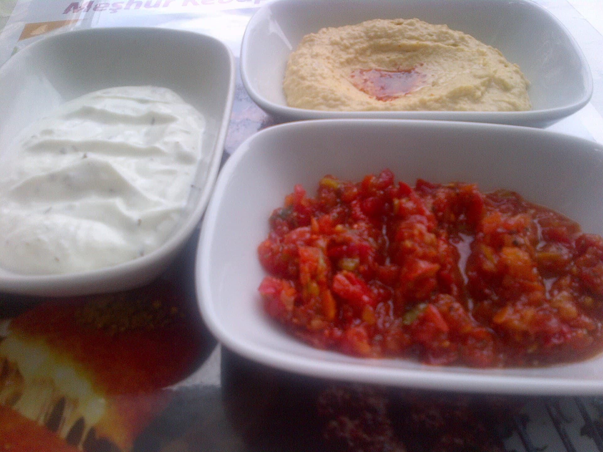 Mediterranean meze spread with hummus and dips, some of the best Mediterranean food in Dallas